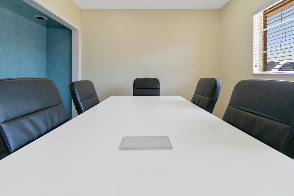 Conference room available for up to 8 people.